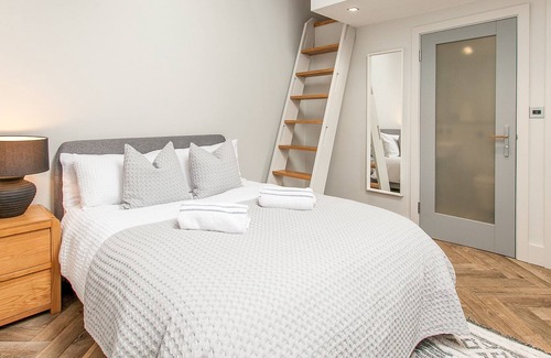 Etchinghill Cottage | Nestled in idyllic Kent countryside, this beautiful Grade II listed, flint-and-brick barn has been t