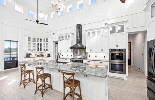 Gulf Shores House | New, bayfront custom home with pier for your boat plus outside deck