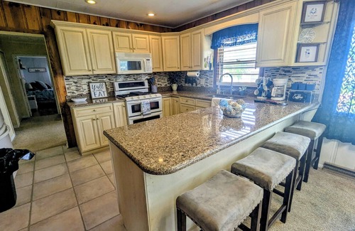 Bass Lake House | NEW! Cozy brick RANCH home with LAKE VIEWS along with Peace AND Serenity!