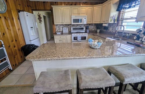 Bass Lake House | NEW! Cozy brick RANCH home with LAKE VIEWS along with Peace AND Serenity!