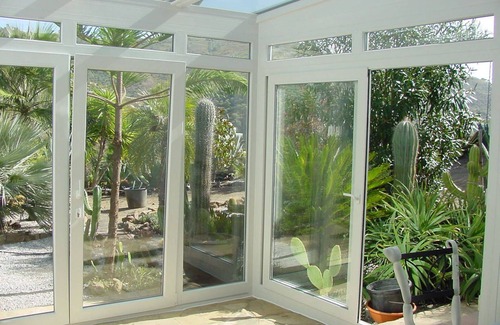 Sayalonga House | New holiday home with fireside, central heating, palm trees and pool