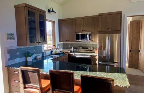 Victor House | New Home on 28 Acres with rivers, wetlands, farm animals and Mt. Views!