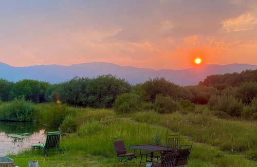 Victor House | New Home on 28 Acres with rivers, wetlands, farm animals and Mt. Views!