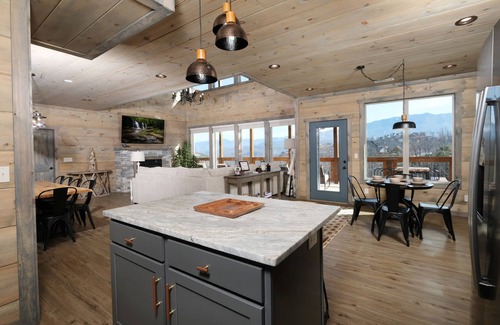 Chalet Village North Cabin | NEW Luxury 3-story cabin! MTN Views Hot Tub, Game Room, Fire Pit- Summer Pools!