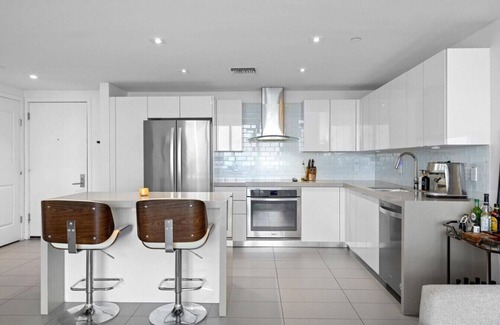 Town Square Condo | NEW | Ocean View w/Peloton, Workspace, Parking