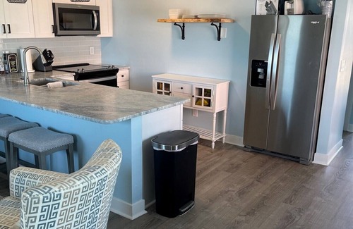 Kure Beach Condo | Newly Renovated Beach Front Condo with indoor pool and hot tub! Winter rates!