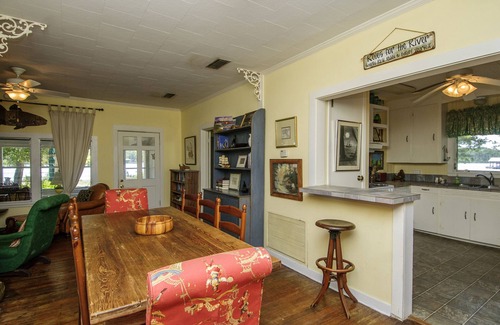 Perdido Beach Cottage | nnCharming Waterfront Retreat on Palmetto Creekn