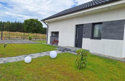 Cekcyn House | Nowoczesny wypoczynek - dom blisko jeziora i lasu
