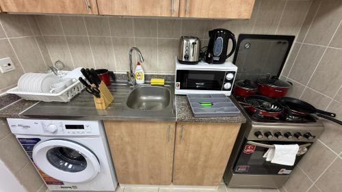 International City Apartment | O07 Luxury Furnished Studio Apartment near bus stop Garden view Persia Cluster