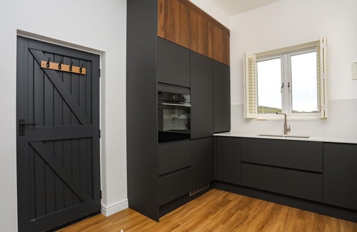 Henryd Cottage | OAKWOOD STABLES, with open fire in Conwy