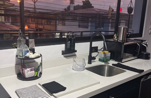 Carmen Apartment | Oasis Loft 5min from SJO airport cozy and comfy fully equipment down town A/C