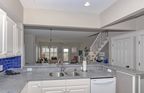 South Beach House | Ocean front duplex with master balcony overlooking the beach; newer six passenger golf cart