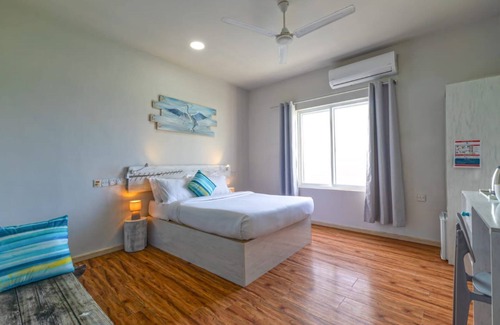 Cocoa Island Hotel | Ocean Pearl : Deluxe Triple Room