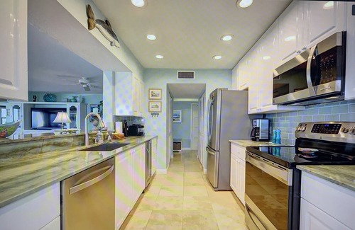 Stuart Condo | OCEANFRONT CONDO ON HUTCHINSON ISLAND STUART-CORNER WITH PANORAMIC OCEAN VIEWS