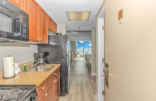 Golden Mile Condo | Oceanfront Studio With Massive Indoor Waterpark! Water Slides and More! Dunes Village Resort 347