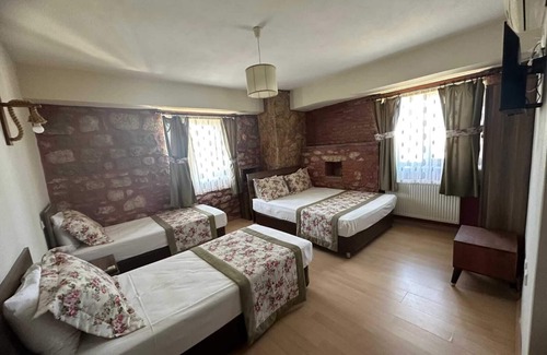 Ezine Hotel | Odunluk Tas Konak Otel