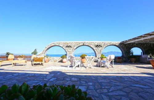 Agios Ioannis Villa | On the Rocks Villa w Hot Tub at Cavo Delos