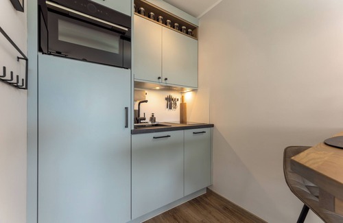 Wenningstedt-Braderup Apartment | One room and many possibilities: the high-quality couch invites you to c