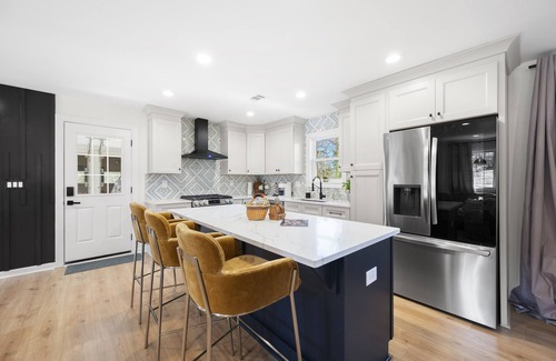 Snellville House | Outdoor Projector, Arcade, Fire Pit, 2 Living Rooms, Fire Pit, and more!