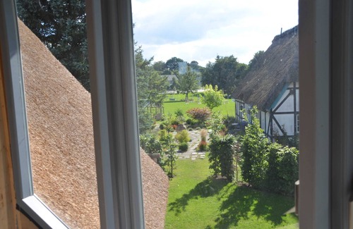 Grebin Apartment | Owl tower - thatched aspen house