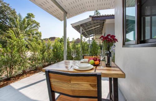 Rawai Villa | Oxavia Garden Oasis in Nai Harn - Your Private Tropical Garden with 3 Cabins and Jacuzzi