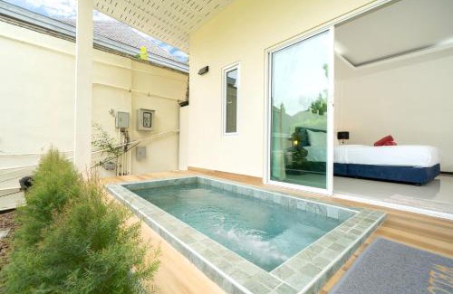 Rawai Villa | Oxavia Garden Oasis in Nai Harn - Your Private Tropical Garden with 3 Cabins and Jacuzzi