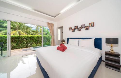 Rawai Villa | Oxavia Garden Oasis in Nai Harn - Your Private Tropical Garden with 3 Cabins and Jacuzzi