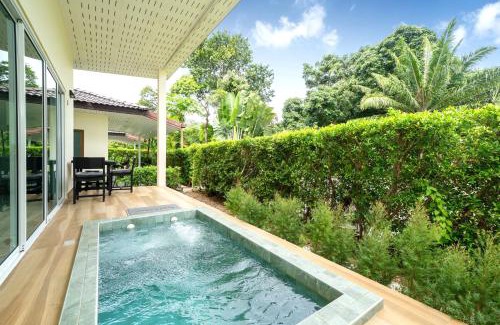 Rawai Villa | Oxavia Garden Oasis in Nai Harn - Your Private Tropical Garden with 3 Cabins and Jacuzzi