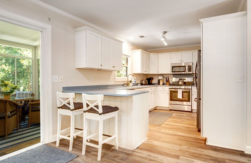 Sunset Point House | Palmetto-lined home with porches, yard & hammock - walk to beach/town