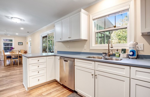 Sunset Point House | Palmetto-lined home with porches, yard & hammock - walk to beach/town