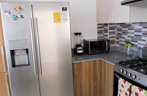 Punal Apartment | Paraiso de verano . Whence you hacemos sentir como en casa.aun estando lejos