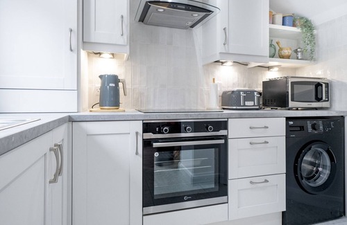 Queens Quarter House | Pass the Keys | Rathcool Gorgeous Terrace with Outdoor Living Cafes and Bars