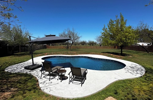 Abilene House | Peace and quiet in this large, beautiful, country retreat with a private pool!