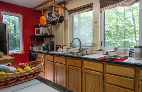 Southeast Raleigh House | Peace & Privacy in a Dutch Colonial Style Home