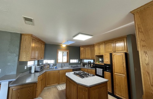 Anchor Bay House | Peaceful Retreat with Ocean Views, Tall Pine Trees, and Beautiful Garden