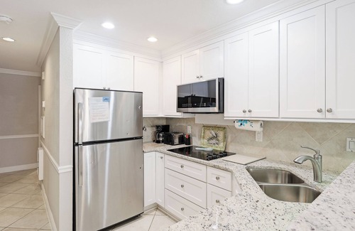 Bradenton Beach Condo | Peak a boo Gulf of Mexico balcony views! Direct beach access! Autumn and winter dates available!