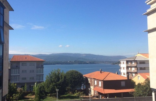 Rianxo Apartment | Penthouse with large terrace and sea views, with free WiFi