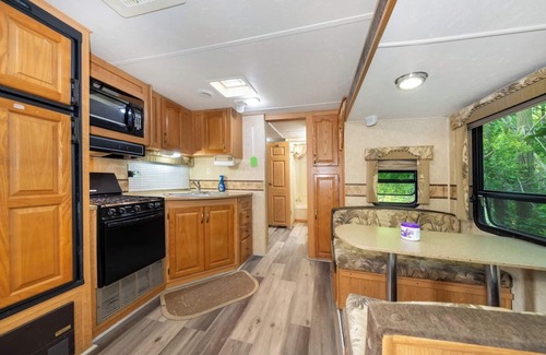 Miller Beach Cottage | Pet-friendly 2BR Camper With Fire Pit & Grill