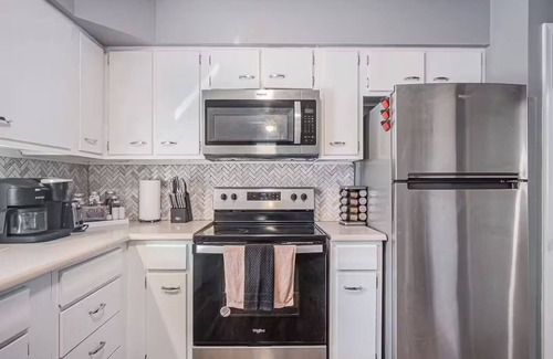 North Central Omaha House | Pet Friendly Duplex 6Ft Fence King Bed