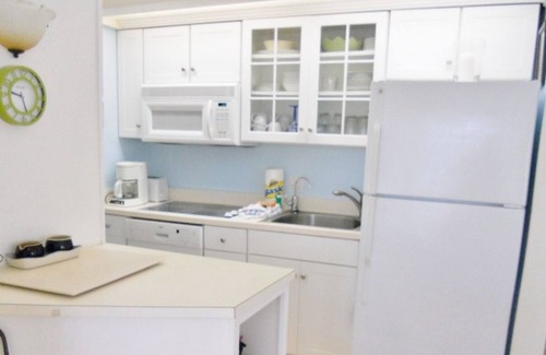 Night Heron Villa | Pet Friendly With Walk to Beach! Private, Quiet Retreat! Access to Pool