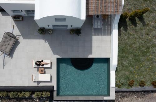 Oia Apartment | Phaos at Saint John Villas with private heated pool