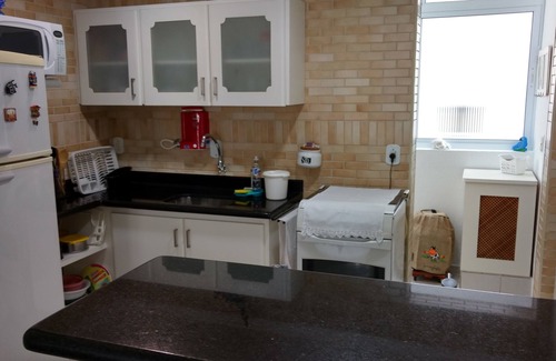 Pitangueiras Apartment | Pitangueiras balcony with sea view, wifi, garage and beach service