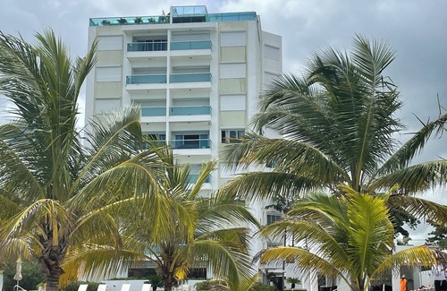 Quisqueya Apartment | PLAYA CORAL nCozy 2-bedroom apartment in charming Playa Juan Dolio with WiFi, AC