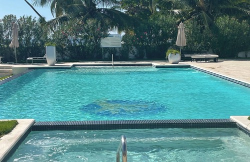 Quisqueya Apartment | PLAYA CORAL nCozy 2-bedroom apartment in charming Playa Juan Dolio with WiFi, AC