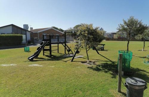 Pearly Beach House | Playful waves