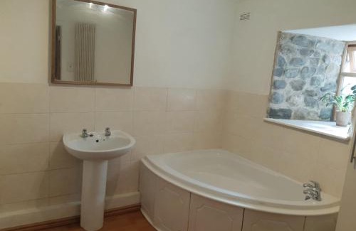 Tewitfield House | Plough Cottage is a 18th Century barn conversion offering a tranquil rural retreat 9 miles from the Lake District National Park