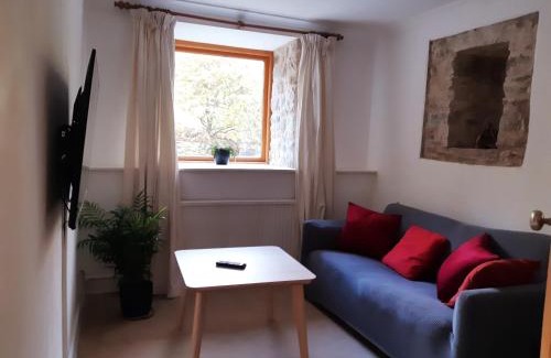 Tewitfield House | Plough Cottage is a 18th Century barn conversion offering a tranquil rural retreat 9 miles from the Lake District National Park