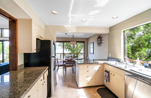 Gig Harbor House | PNW MCM 155ft Private Waterfront Gem on Raft Island w/Hot Tub by RedAwning