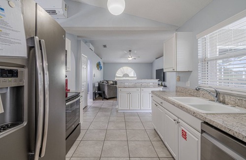 Sunridge Woods House | Pondside Paradise Beautiful 4 bedroom pond facing pool home