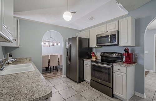 Sunridge Woods House | Pondside Paradise Beautiful 4 bedroom pond facing pool home